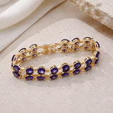 Gold Bracelet with Amethyst Tennis Design